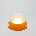 Cordless table lamp in orange glass, Nebulume model