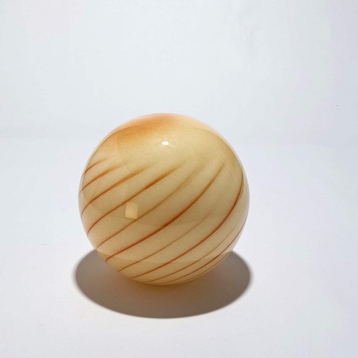 Cordless table lamp in orange striped blown glass, Ø 25 cm