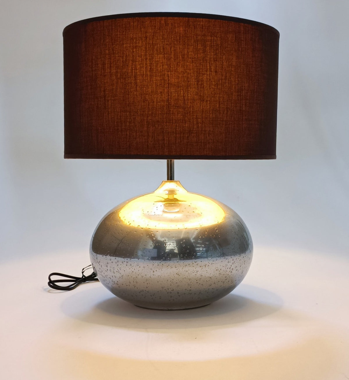 Table lamp in bubbled glass with a silver oval base